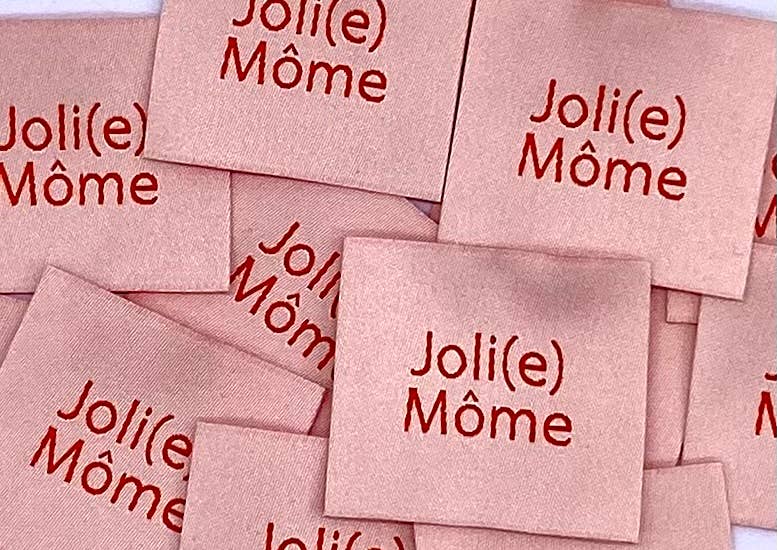 Étiquette à coudre : JOLI(E) MÔME Saumon