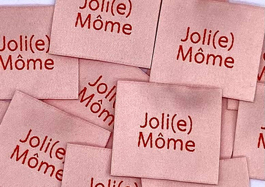 Étiquette à coudre : JOLI(E) MÔME Saumon